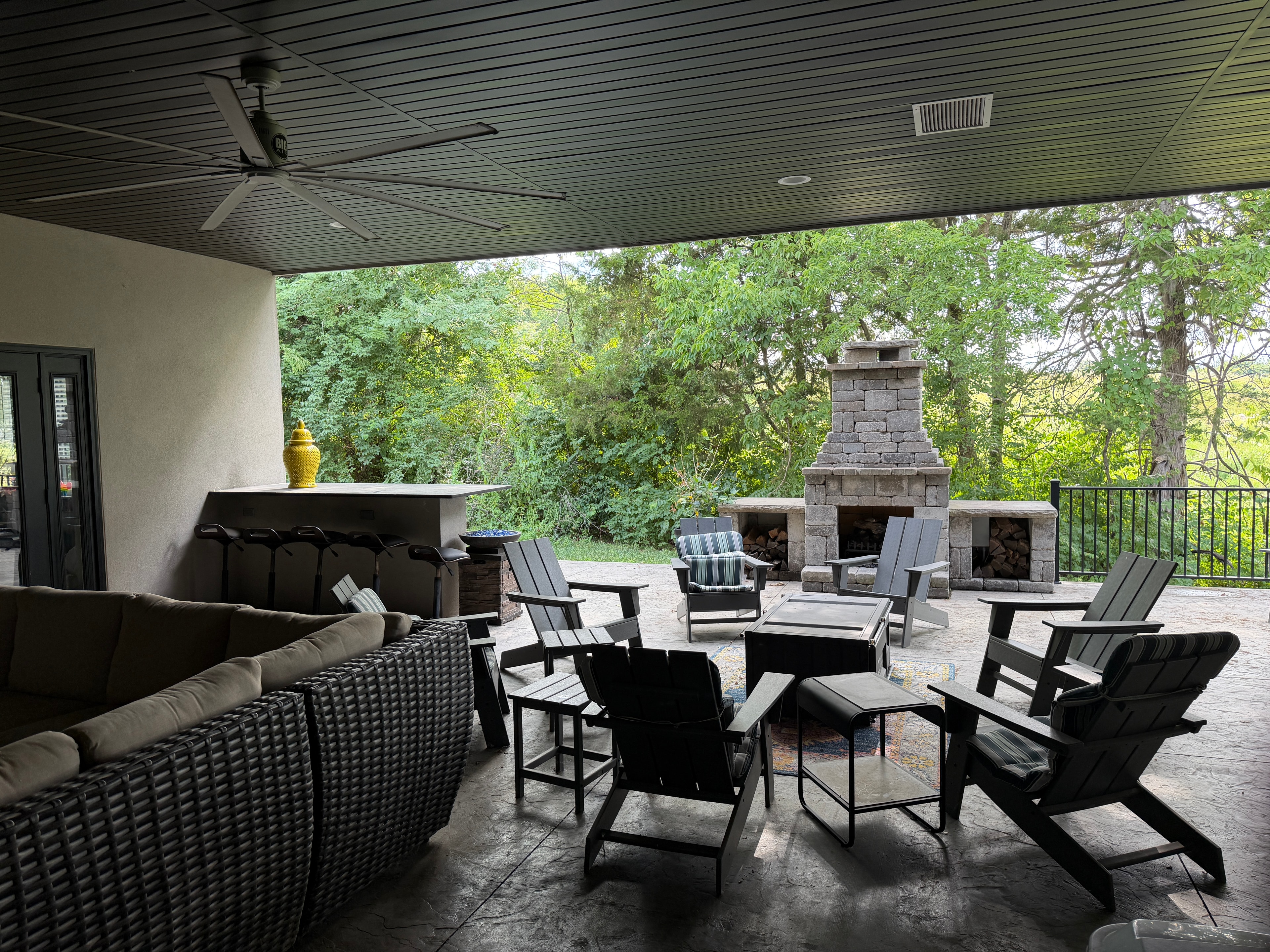 Outdoor patio with stone fireplace